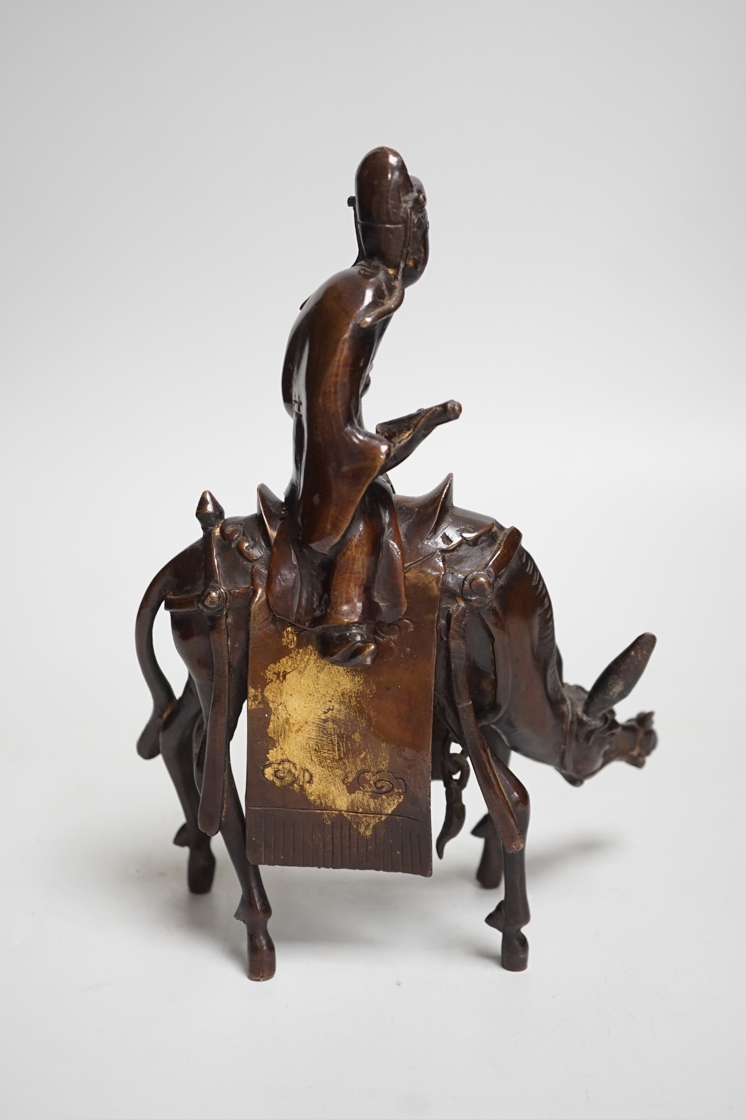 A Chinese late Ming bronze censer of an official riding a horse, 23cm